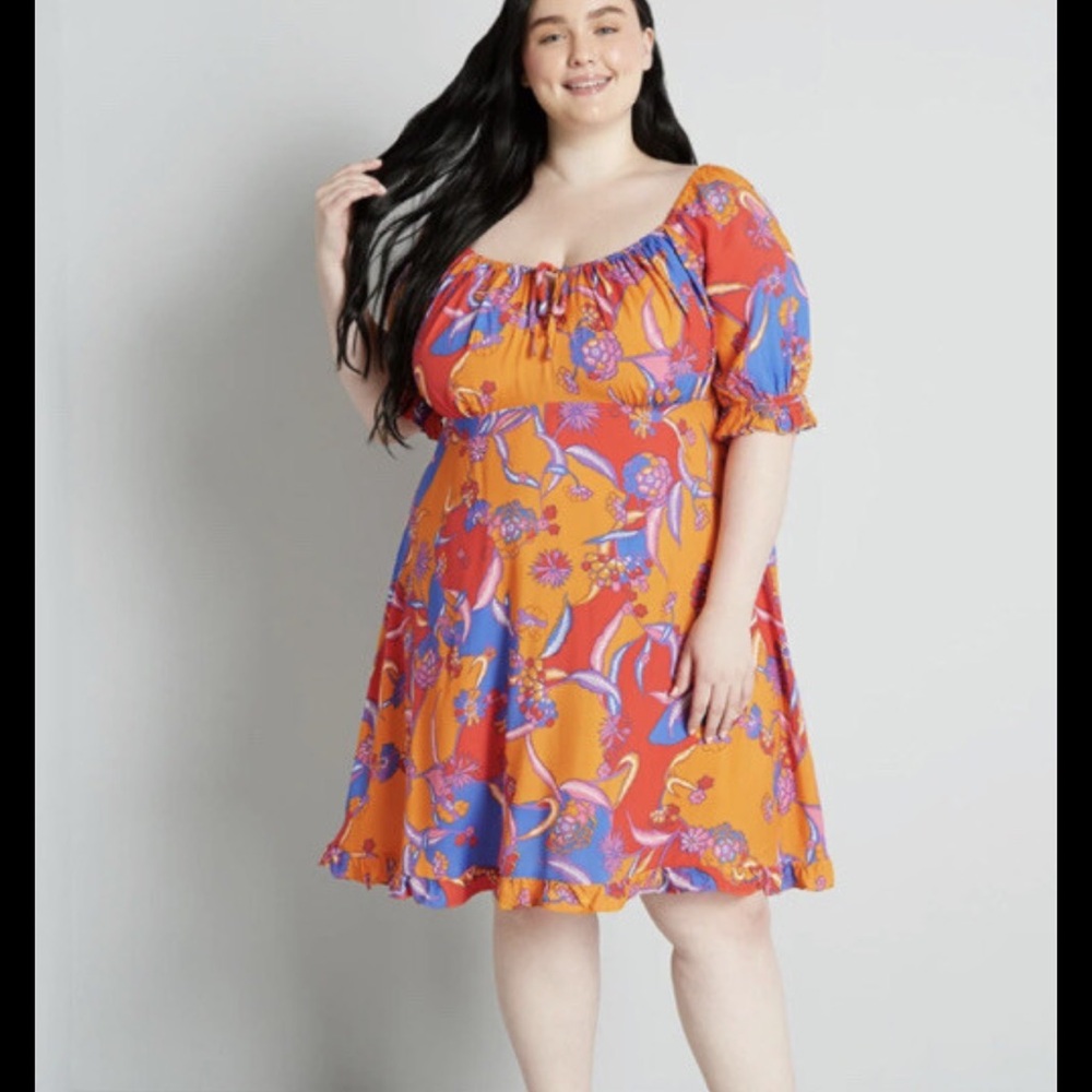 NWT Modcloth Taking a Tropical Twirl Babydoll dress features a vibrant orange an